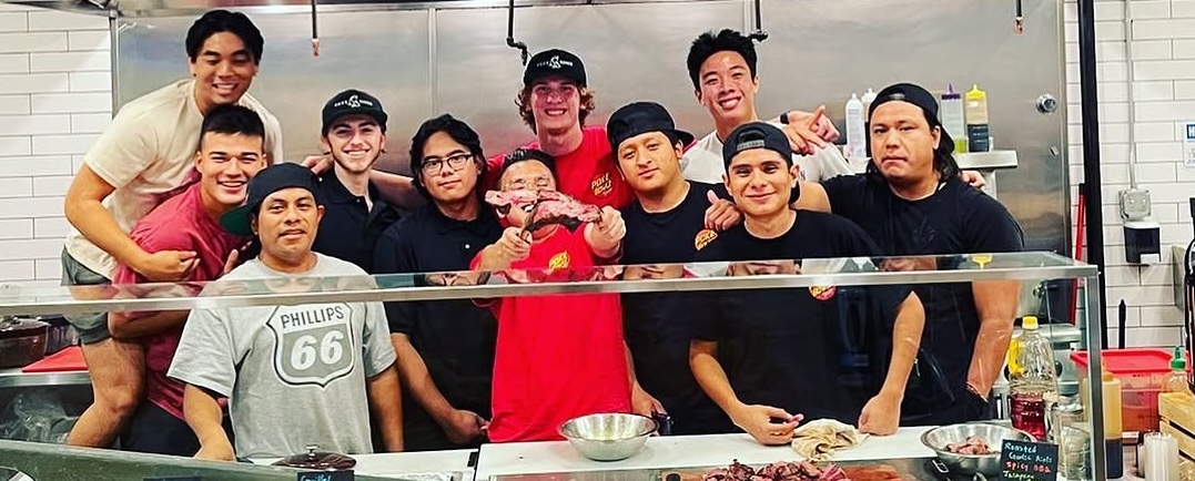 The Poke Bowlz team behind the counter